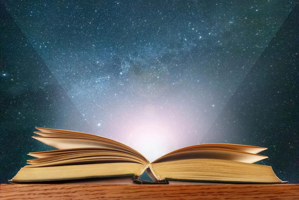 Open book with rays of light emerging from it