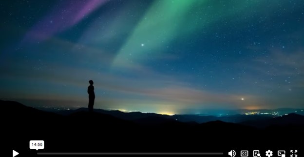 Person looking at the northern lights