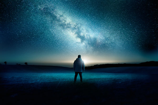 Person looking at the milky way
